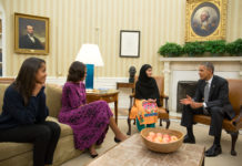 President Barack Obama, First Lady Michelle Obama, and their daughter Malia meet with Malala Yousafzai,