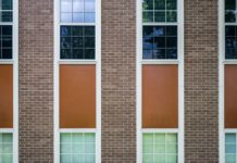 A row of windows on a school building.