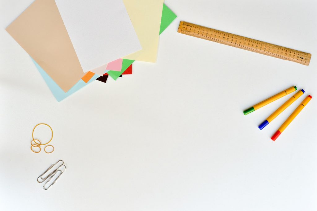 An array of stationery against a white background.
